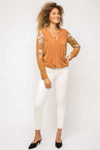 Surplice front with button detail top