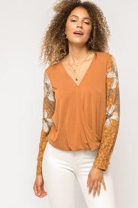 Surplice front with button detail top